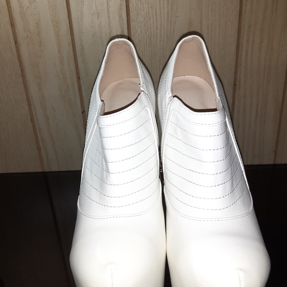 Shoes - Great pair of cream high heels.